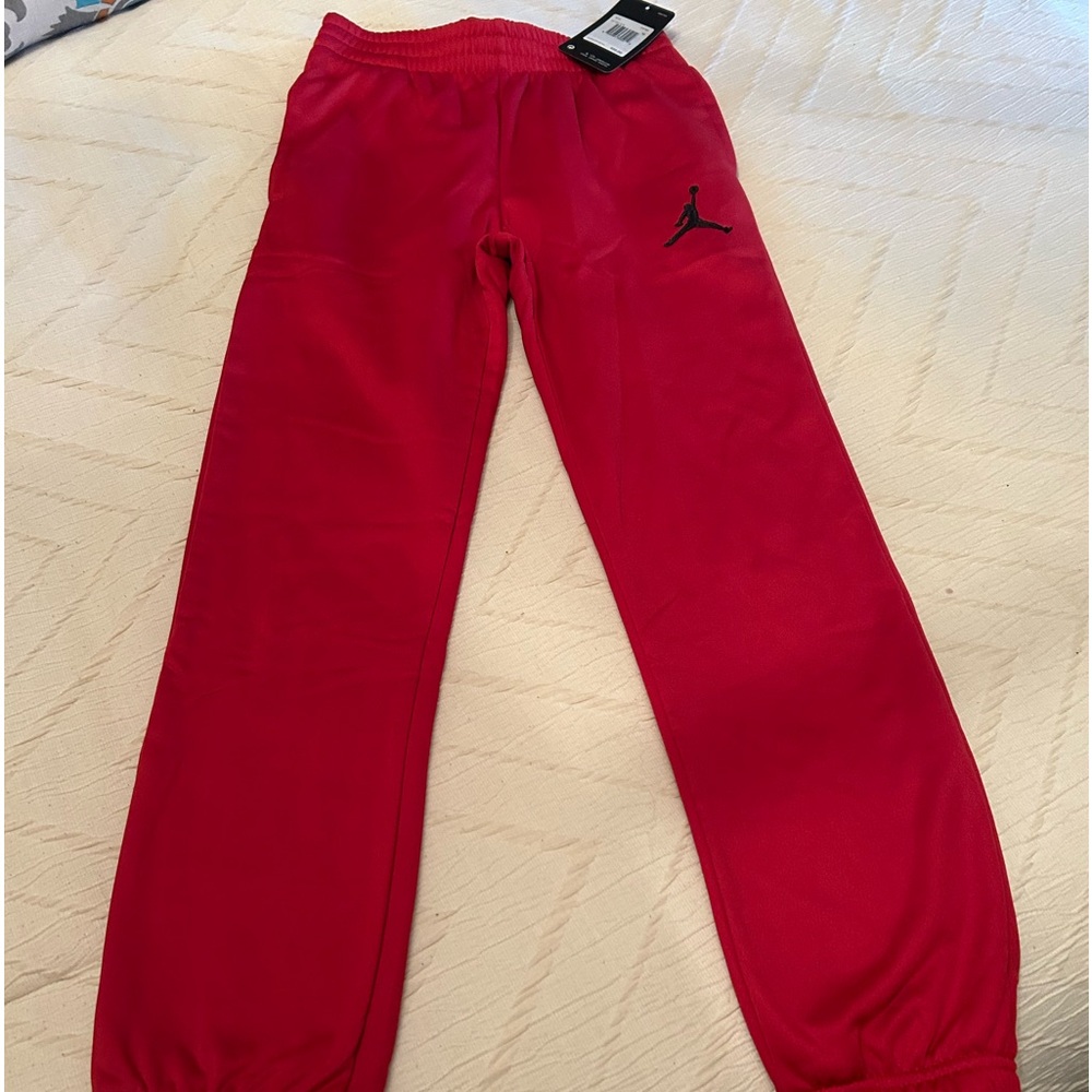 Boys Nike joggers in Red